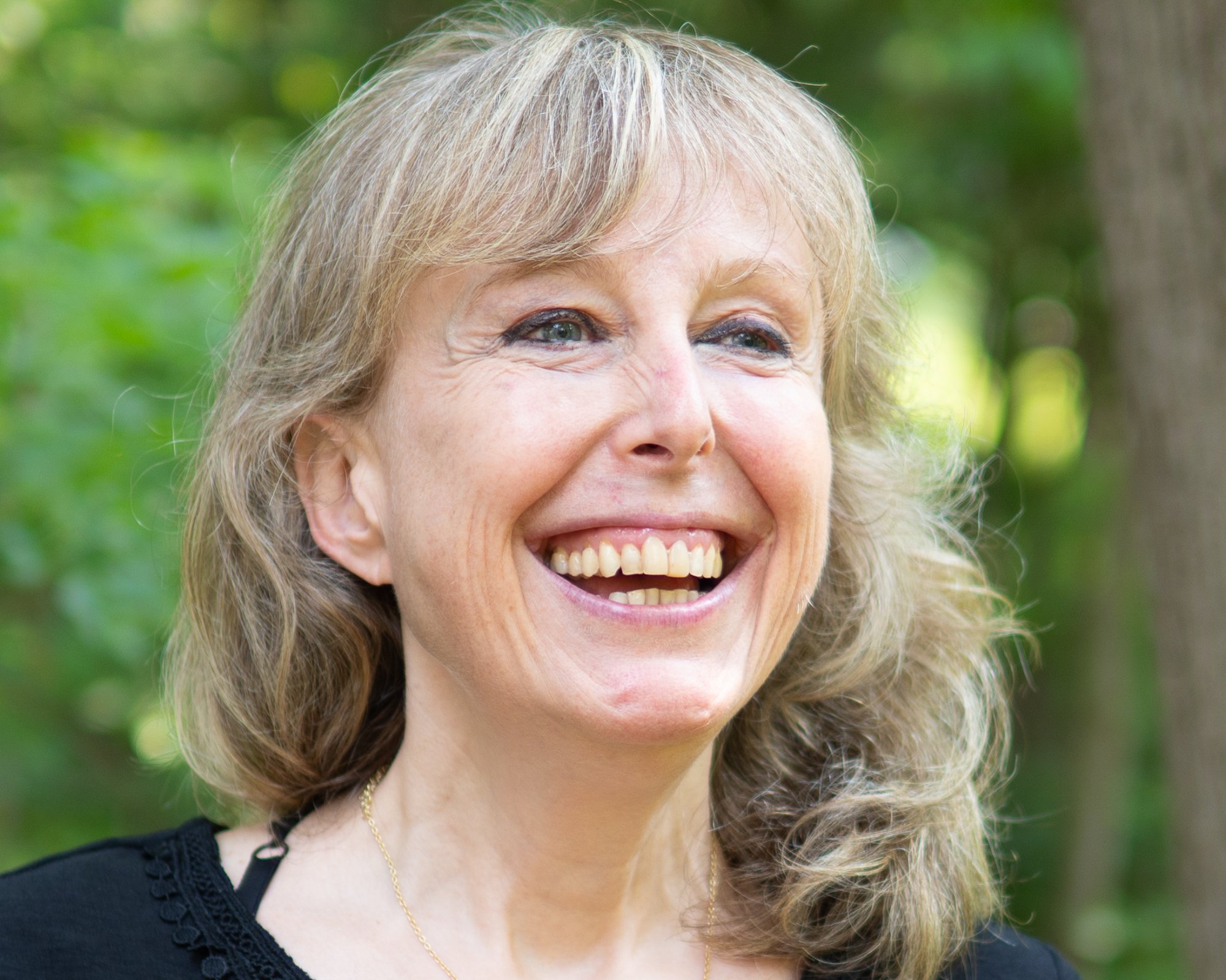 Portrait - candid laughing portrait outdoors