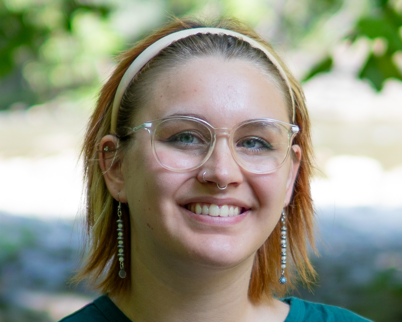 Portrait - close-up headshot with soft background